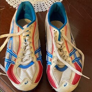 Asics Cream, Red, and Blue Sneakers cleats  for running